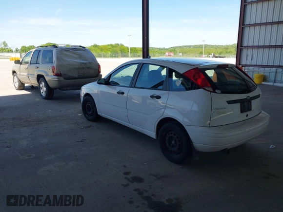 2007 Ford Focus S z VIN 1FAFP37N97W238404, wystawiony jako IAAI lot #42195944 z przebiegiem 168 390 mil mil oraz . Historia ofert i sprzedaży dostępna na DreamBid. Obrazek 3.