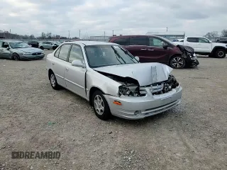 2004 Hyundai Accent GL with VIN KMHCG45C94U564176, listed as a Copart auction lot 82963944 with 454,400 mi miles and Salvage Title. Bid and sale history available at carsss.com. Image 11.