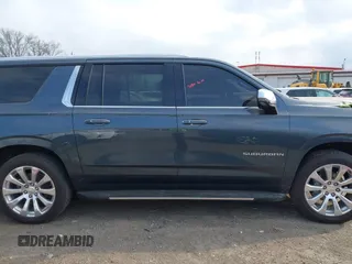 2021 Chevrolet Suburban Premier with VIN 1GNSKFKDXMR295929, listed as a IAAI auction lot 42033006 with 46,733 mi miles and . Bid and sale history available at DreamBid. Image 13.