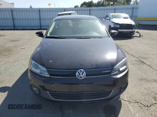 2014 Volkswagen Jetta Hybrid SE z VIN 3VW637AJ7EM296699, wystawiony jako Copart lot #61054715 z przebiegiem 147 308 mil mil oraz Czysty tytuł • Clean title. Historia ofert i sprzedaży dostępna na DreamBid. Obrazek 5.