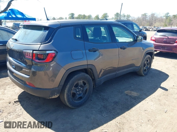 2018 Jeep Compass Sport with VIN 3C4NJCAB7JT107040, listed as a IAAI auction lot 41993385 with 251,154 mi miles. Bid and sale history available at carsss.com. Image 4.