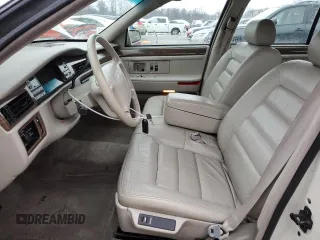 1995 Cadillac DeVille z VIN 1G6KD52B8SU274053, wystawiony jako Copart lot #86429934 z przebiegiem 100 496 mil mil oraz Szkoda całkowita • Salvage title. Historia ofert i sprzedaży dostępna na DreamBid. Obrazek 7.