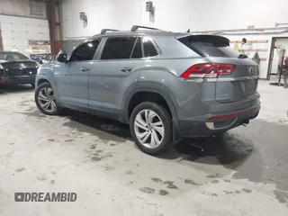 2021 Volkswagen Atlas SEL z VIN 1V2BE2CA6MC203777, wystawiony jako IAAI lot #42507511 z przebiegiem 76 358 mil mil oraz . Historia ofert i sprzedaży dostępna na DreamBid. Obrazek 3.