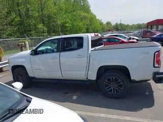 2019 GMC Canyon 4WD SLE z VIN 1GTG6CENXK1319647, wystawiony jako IAAI lot #42039568 z przebiegiem 56 371 mil mil oraz . Historia ofert i sprzedaży dostępna na DreamBid. Obrazek 15.