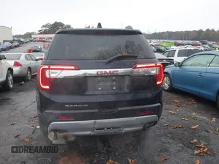 2022 GMC Acadia SLT with VIN 1GKKNMLS1NZ103322, listed as a IAAI auction lot 41033861 with 37,348 mi miles and . Bid and sale history available at DreamBid. Image 16.