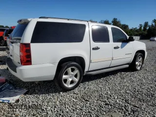 2010 Chevrolet Suburban LS with VIN 1GNUCHE02AR264258, listed as a Copart auction lot 74085184 with 193,358 mi miles and Salvage Title. Bid and sale history available at carsss.com. Image 3.
