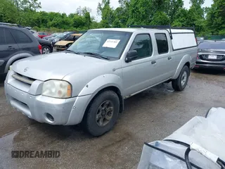 2004 Nissan Frontier XE z VIN 1N6ED29X04C402513, wystawiony jako IAAI lot #42241305 z przebiegiem 316 598 mil mil oraz . Historia ofert i sprzedaży dostępna na DreamBid. Obrazek 2.