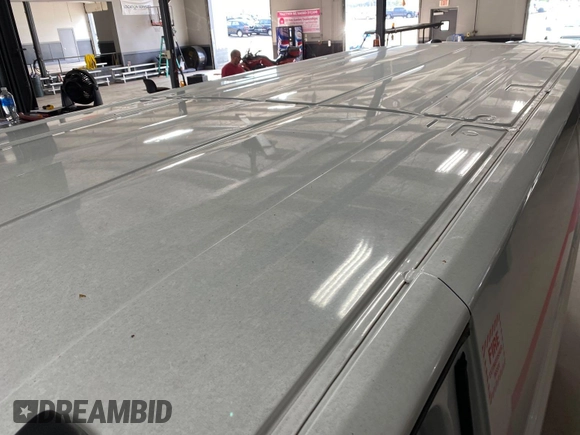 2020 Ford Transit Cargo with VIN 1FTBR1Y87LKA53852, listed as a IAAI auction lot 42300106 with 89,023 mi miles and . Bid and sale history available at DreamBid. Image 14.