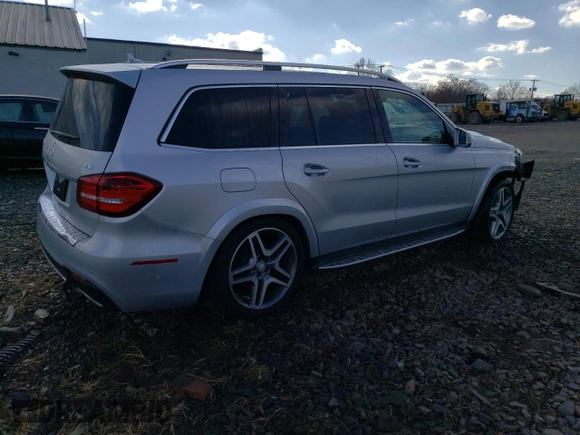 2017 Mercedes-Benz GLS 550 with VIN 4JGDF7DE0HA804282, listed as a Copart auction lot 82790194 with 62,409 mi miles and Salvage title. Bid and sale history available at DreamBid. Image 3.