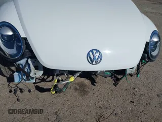 2018 Volkswagen Beetle S with VIN 3VW5DAAT1JM506988, listed as a IAAI auction lot 41589324 with 50,873 mi miles and . Bid and sale history available at DreamBid. Image 6.