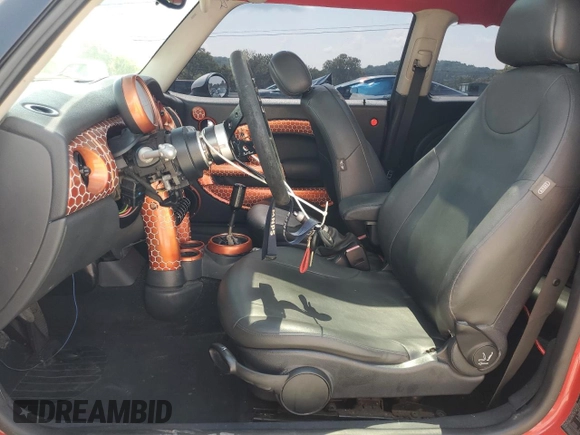2004 MINI Hardtop with VIN WMWRC33444TC50103, listed as a Copart auction lot 63449615 with 144,467 mi miles and Salvage title. Bid and sale history available at DreamBid. Image 7.