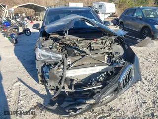 2019 BMW X1 sDrive28i with VIN WBXHU7C52K5L11560, listed as a IAAI auction lot 41354422 with 115,401 mi miles. Bid and sale history available at carsss.com. Image 6.