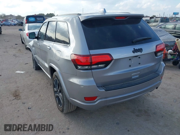 2020 Jeep Grand Cherokee Altitude with VIN 1C4RJEAGXLC403693, listed as a IAAI auction lot 41482425 with 67,161 mi miles and . Bid and sale history available at DreamBid. Image 3.