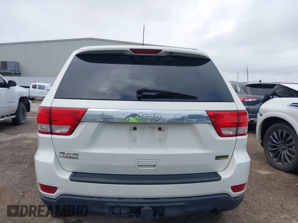 2012 Jeep Grand Cherokee Laredo with VIN 1C4RJFAG5CC224032, listed as a IAAI auction lot 42069334 with 106,614 mi miles. Bid and sale history available at carsss.com. Image 17.