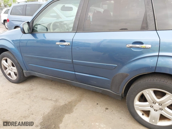 2009 Subaru Forester (Natl) X w/Premium Pkg with VIN JF2SH63619H732822, listed as a IAAI auction lot 42085763 with 107,424 mi miles. Bid and sale history available at carsss.com. Image 6.