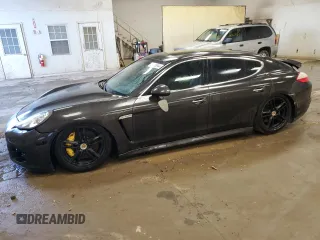 2010 Porsche Panamera Turbo z VIN WP0AC2A75AL091138, wystawiony jako Copart lot #80109844 z przebiegiem 134 360 mil mil oraz Czysty tytuł • Clean title. Historia ofert i sprzedaży dostępna na DreamBid. Obrazek 1.