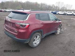 2022 Jeep Compass Latitude with VIN 3C4NJDBB7NT206323, listed as a IAAI auction lot 42038930 with 84,976 mi miles and . Bid and sale history available at DreamBid. Image 4.