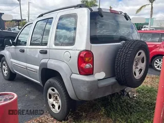 2002 Jeep Liberty Sport with VIN 1J4GL48K72W243074, listed as a Copart auction lot 47081875 with 127,178 mi miles and Clean Title. Bid and sale history available at carsss.com. Image 3.
