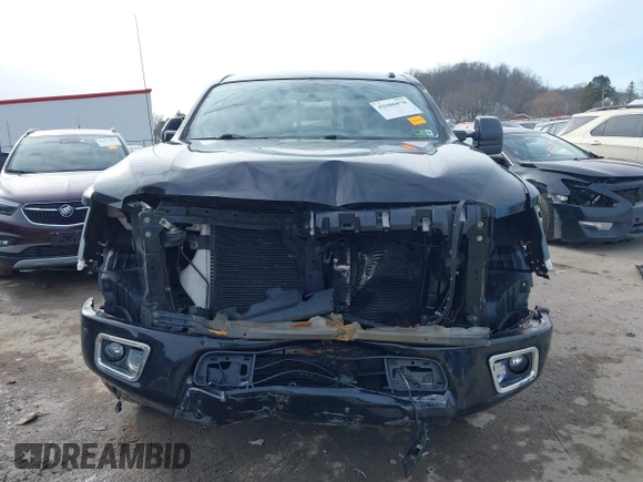 2018 Nissan Titan XD SV with VIN 1N6BA1F49JN521838, listed as a IAAI auction lot 41606878 with 143,742 mi miles. Bid and sale history available at carsss.com. Image 13.