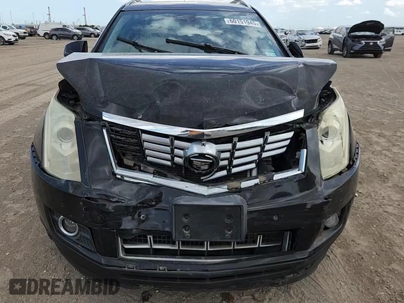 2015 Cadillac SRX Performance Collection with VIN 3GYFNCE34FS574161, listed as a Copart auction lot 60151945 with 108,844 mi miles and Salvage title. Bid and sale history available at DreamBid. Image 13.