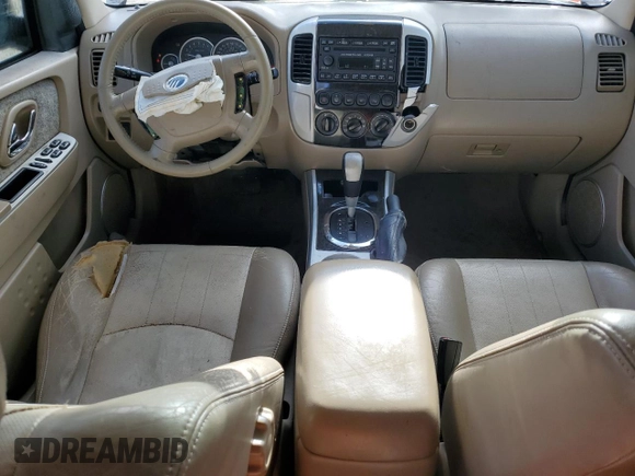 2007 Mercury Mariner Premier z VIN 4M2CU87147KJ17376, wystawiony jako Copart lot #51513755 z przebiegiem 93 763 mil mil oraz Szkody całkowita. Historia ofert i sprzedaży dostępna na DreamBid. Obrazek 8.