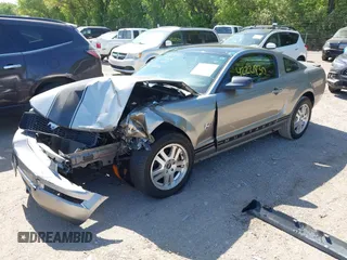 2009 Ford Mustang with VIN 1ZVHT80N295128872, listed as a IAAI auction lot 42221830 with 112,294 mi miles and . Bid and sale history available at DreamBid. Image 2.