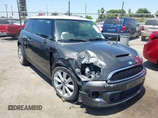 2013 MINI Hardtop S with VIN WMWSV3C52DT396453, listed as a IAAI auction lot 42583892 with 143,190 mi miles and . Bid and sale history available at DreamBid. Image 1.