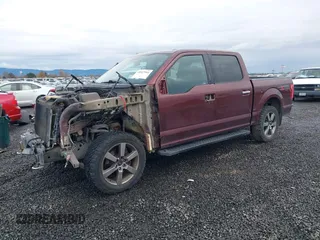 2015 Ford F-150 XLT with VIN 1FTEW1EF2FFA17900, listed as a IAAI auction lot 40927904 with 119,105 mi miles. Bid and sale history available at carsss.com. Image 2.