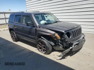 2014 Jeep Patriot Sport with VIN 1C4NJRBB7ED886081, listed as a Copart auction lot 52406205 with 61,002 mi miles and Salvage Title. Bid and sale history available at DreamBid. Image 4.