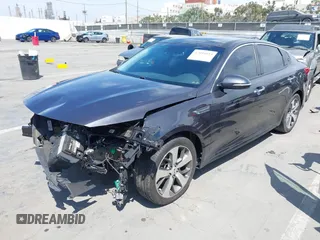 2019 Kia Optima LX with VIN 5XXGT4L39KG290775, listed as a IAAI auction lot 42034654 with 79,442 mi miles. Bid and sale history available at carsss.com. Image 2.