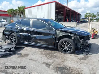 2023 Toyota Camry SE with VIN 4T1G11AK6PU741172, listed as a IAAI auction lot 41599909 with 56,668 mi miles and . Bid and sale history available at DreamBid. Image 18.