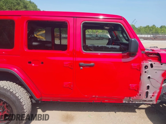 2022 Jeep Wrangler Unlimited Rubicon with VIN 1C4HJXFG0NW100620, listed as a IAAI auction lot 42534993 with 21,614 mi miles and . Bid and sale history available at DreamBid. Image 13.
