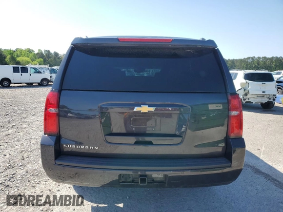 2017 Chevrolet Suburban LT z VIN 1GNSCHKC5HR329037, wystawiony jako Copart lot #52016315 z przebiegiem 215 859 mil mil oraz Szkoda całkowita • Salvage title. Historia ofert i sprzedaży dostępna na DreamBid. Obrazek 6.