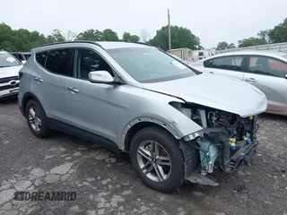 2018 Hyundai Santa Fe 2.4L with VIN 5XYZU3LB0JG500357, listed as a IAAI auction lot 42336564 with 77,649 mi miles and . Bid and sale history available at DreamBid. Image 1.