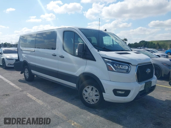 2023 Ford Transit Passenger XL with VIN 1FBAX2YG6PKB08879, listed as a IAAI auction lot 42137671 with 44,204 mi miles. Bid and sale history available at carsss.com. Image 1.