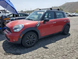 2014 MINI Countryman S z VIN WMWZC5C5XEWP37582, wystawiony jako Copart lot #54449735 z przebiegiem 135 485 mil mil oraz Szkody całkowita. Historia ofert i sprzedaży dostępna na DreamBid. Obrazek 1.