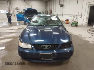 2002 Ford Mustang Standard z VIN 1FAFP40452F117630, wystawiony jako IAAI lot #41882744 z przebiegiem 85 218 mil mil oraz . Historia ofert i sprzedaży dostępna na DreamBid. Obrazek 13.