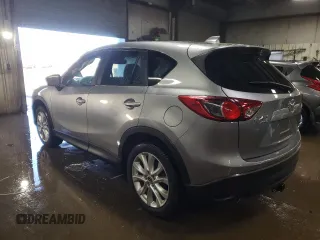 2015 Mazda CX-5 Grand Touring with VIN JM3KE4DY5F0456142, listed as a Copart auction lot 49353845 with 193,512 mi miles and Salvage Title. Bid and sale history available at carsss.com. Image 2.