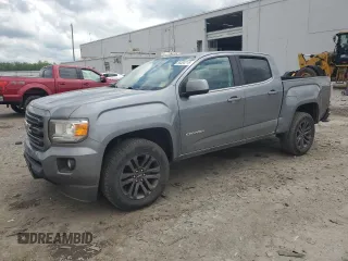 2020 GMC Canyon 4WD SLE z VIN 1GTG6CEN8L1143022, wystawiony jako Copart lot #56458215 z przebiegiem 94 928 mil mil oraz Szkoda całkowita • Salvage title. Historia ofert i sprzedaży dostępna na DreamBid. Obrazek 1.