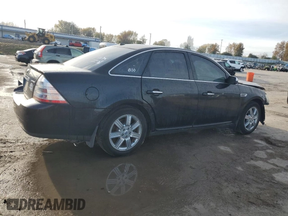 2008 Ford Taurus Limited with VIN 1FAHP25W38G181594, listed as a Copart auction lot 79701014 with 129,968 mi miles and Salvage Title. Bid and sale history available at carsss.com. Image 3.