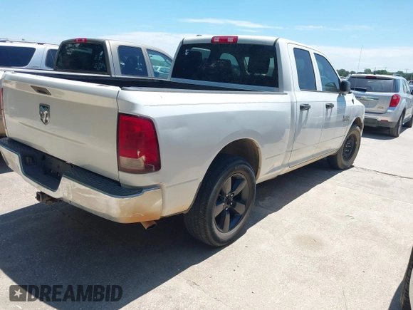 2015 Ram 1500 Tradesman with VIN 1C6RR6FG7FS542799, listed as a IAAI auction lot 42838716 with 166,411 mi miles and . Bid and sale history available at DreamBid. Image 4.