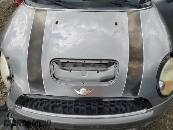 2007 MINI Hardtop S with VIN WMWMF73557TL90986, listed as a Copart auction lot 57850585 with 185,423 mi miles and Salvage title. Bid and sale history available at DreamBid. Image 11.