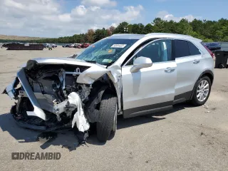 2022 Cadillac XT4 AWD Luxury with VIN 1GYFZBR45NF118075, listed as a Copart auction lot 58654423 with 1,982 mi miles and . Bid and sale history available at carsss.com. Image 1.