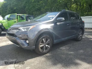 2018 Toyota RAV4 XLE with VIN JTMWFREV5JJ747297, listed as a Copart auction lot 56371505 with 215,598 mi miles and Clean Title. Bid and sale history available at DreamBid. Image 1.
