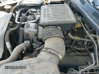 2003 Jeep Grand Cherokee Laredo z VIN 1J4GW48N83C608270, wystawiony jako IAAI lot #42721644 z przebiegiem 122 514 mil mil oraz . Historia ofert i sprzedaży dostępna na DreamBid. Obrazek 12.