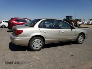 2000 Saturn SL with VIN 1G8ZK5274YZ103237, listed as a Copart auction lot 60558105 with 126,320 mi miles and Salvage title. Bid and sale history available at DreamBid. Image 3.