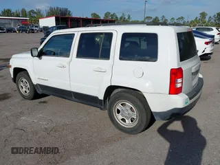 2014 Jeep Patriot Sport with VIN 1C4NJPBBXED671220, listed as a IAAI auction lot 42163245 with 216,848 mi miles. Bid and sale history available at carsss.com. Image 3.