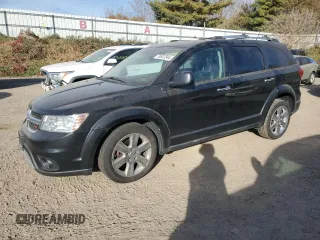 2013 Dodge Journey R/T with VIN 3C4PDDFG6DT736495, listed as a Copart auction lot 76912344 with 186,004 mi miles and Clean title. Bid and sale history available at DreamBid. Image 1.