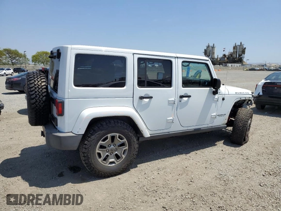 2015 Jeep Wrangler Unlimited Rubicon with VIN 1C4BJWFG6FL508493, listed as a Copart auction lot 54788635 with 127,694 mi miles and Salvage title. Bid and sale history available at DreamBid. Image 3.