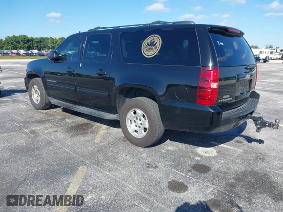 2011 Chevrolet Suburban LS with VIN 1GNSCHE04BR284777, listed as a IAAI auction lot 41291991 with 285,187 mi miles. Bid and sale history available at carsss.com. Image 3.